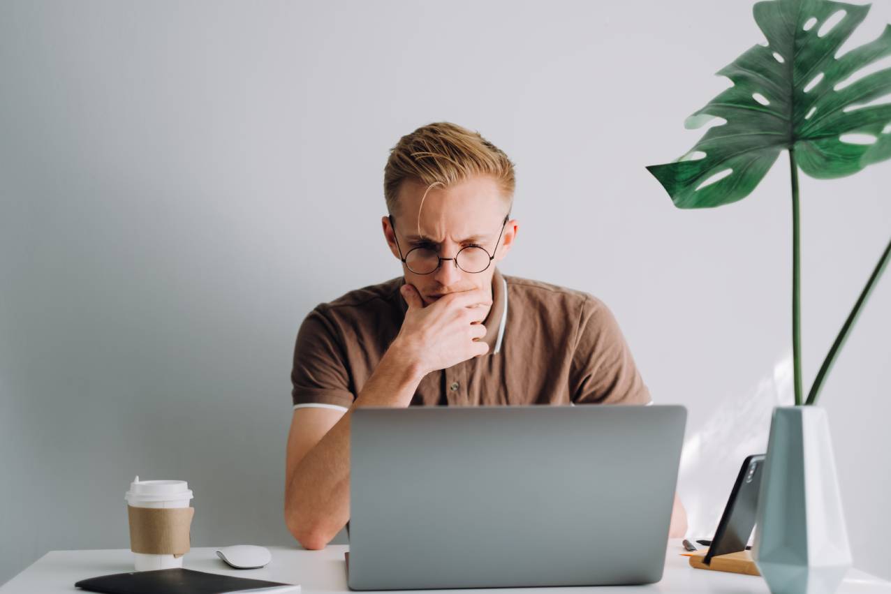 man looking at laptop